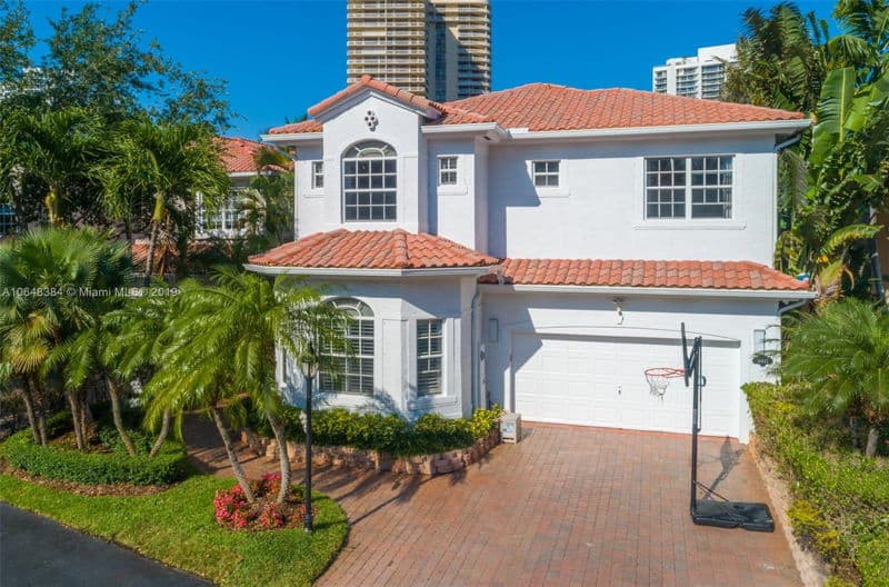 featured image of property, This beautifully remodeled Golden Gate estate is one of only eight waterfront homes in the sought-after gated community.